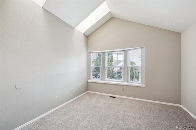 3078 W 107th Pl Unit D, Westminster, CO 80031 - empty room featuring carpet floors, lofted ceiling, and a skylight