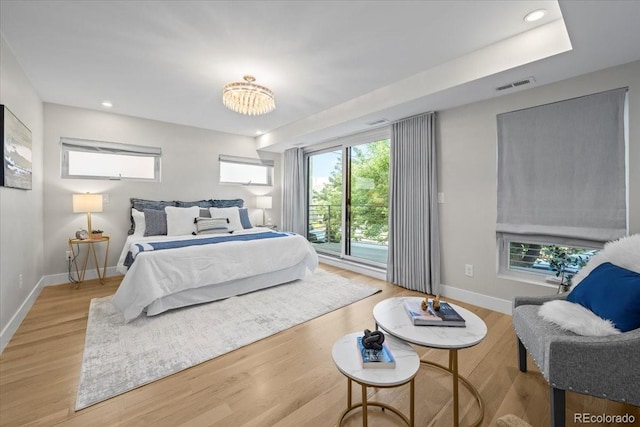 bedroom with light hardwood / wood-style floors