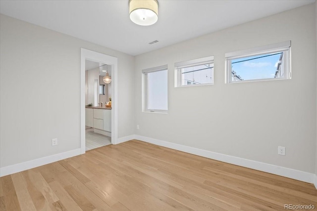 empty room featuring light wood-type flooring