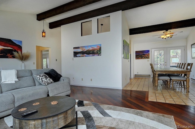 30600 County Road 371, Buena Vista, CO 81211 - living area featuring beamed ceiling, light wood finished floors, high vaulted ceiling, a baseboard heating unit, and french doors