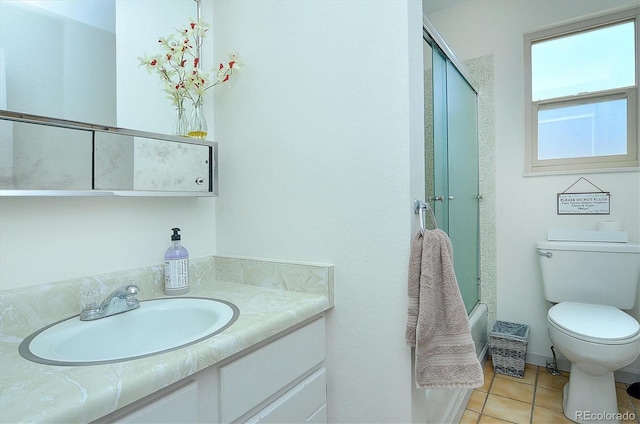 30600 County Road 371, Buena Vista, CO 81211 - full bath with vanity, tile patterned flooring, and enclosed tub / shower combo