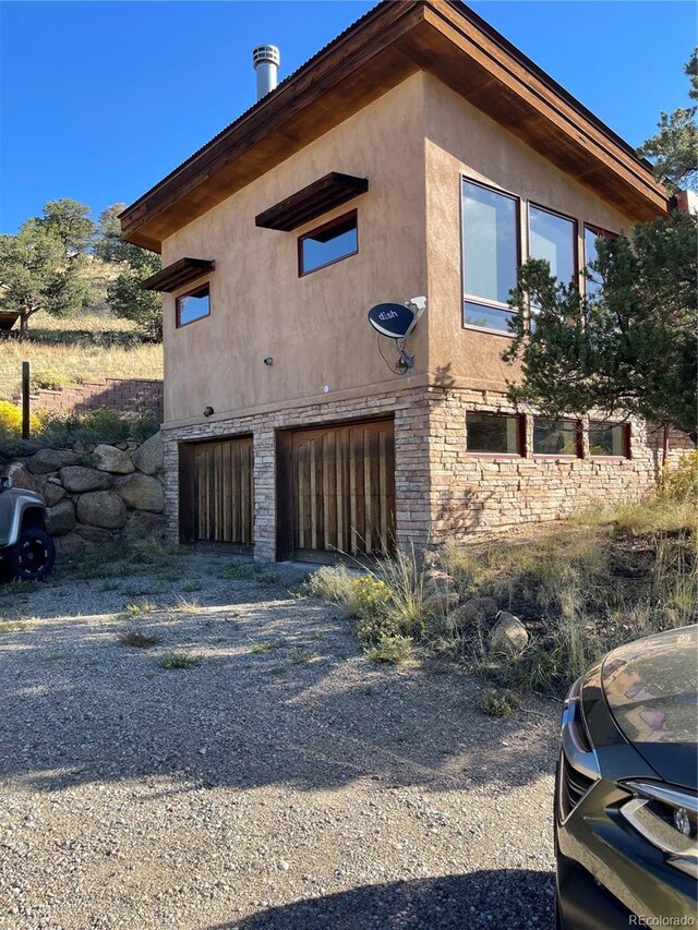 view of home's exterior featuring a garage