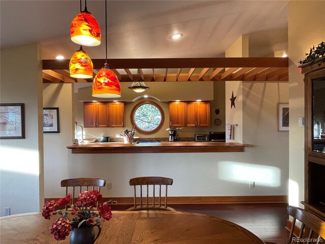 kitchen featuring dark wood-type flooring