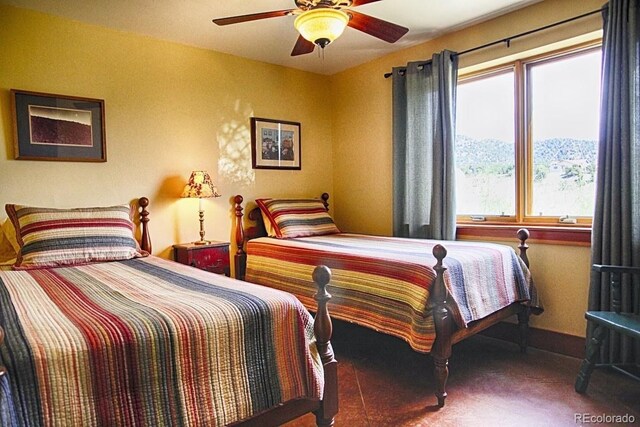 bedroom featuring ceiling fan