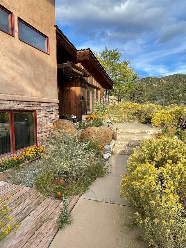 exterior space featuring a mountain view