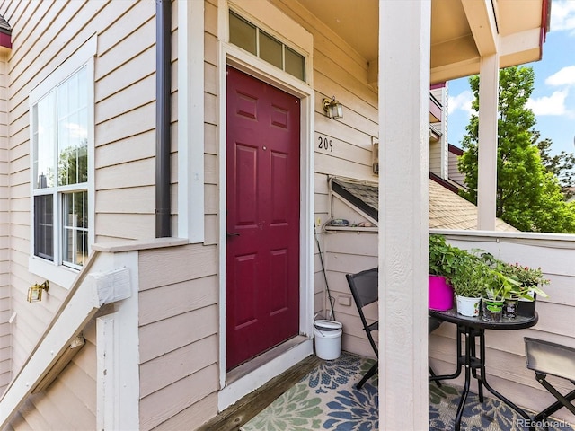 8361 S Upham Way Unit 209, Littleton, CO 80128 - doorway to property with a porch