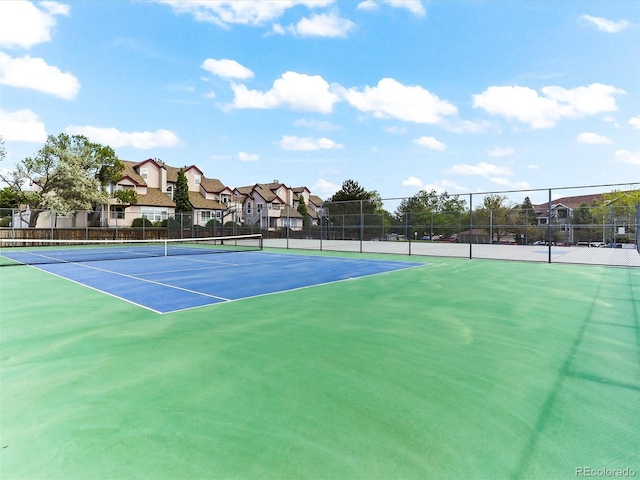 8361 S Upham Way Unit 209, Littleton, CO 80128 - view of tennis court with fence and a residential view