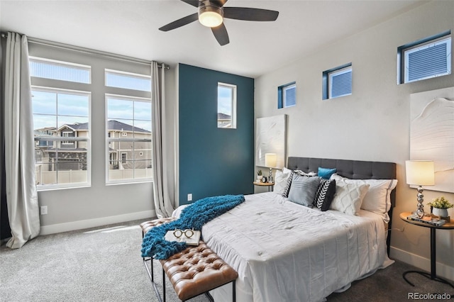 bedroom featuring carpet, baseboards, and ceiling fan