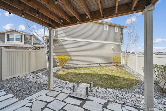 view of yard with a fenced backyard
