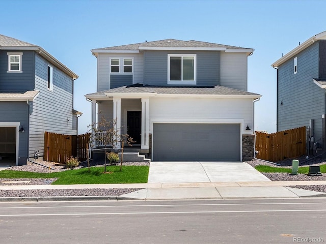 544 97th Ave, Greeley, CO 80634 - view of front facade featuring an attached garage and driveway