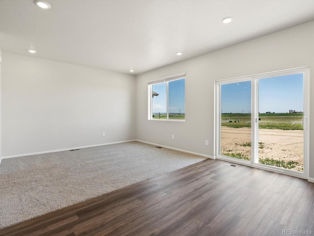 544 97th Ave, Greeley, CO 80634 - empty room featuring recessed lighting and wood finished floors