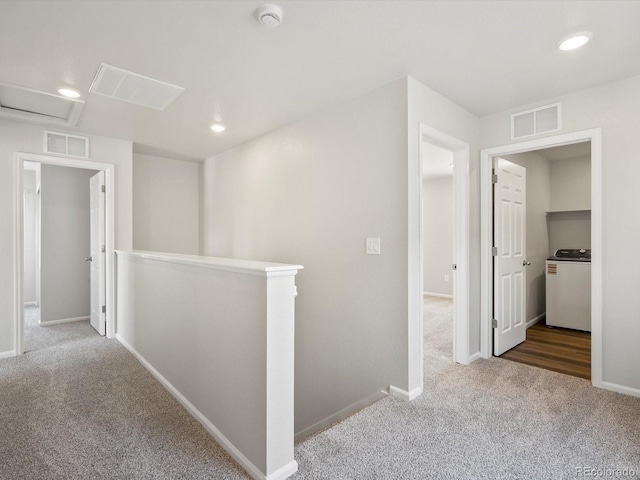 544 97th Ave, Greeley, CO 80634 - hallway featuring washer / clothes dryer, carpet, an upstairs landing, recessed lighting, and attic access