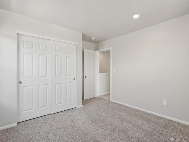 544 97th Ave, Greeley, CO 80634 - unfurnished bedroom with carpet flooring, a closet, and recessed lighting