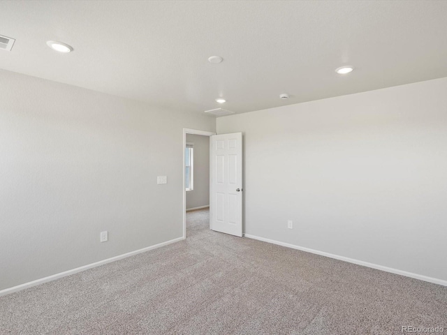 544 97th Ave, Greeley, CO 80634 - carpeted spare room featuring recessed lighting and a smoke detector