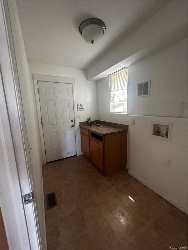 2005 W 86th Ave, Denver, CO 80260 - washroom with hookup for a washing machine and cabinet space