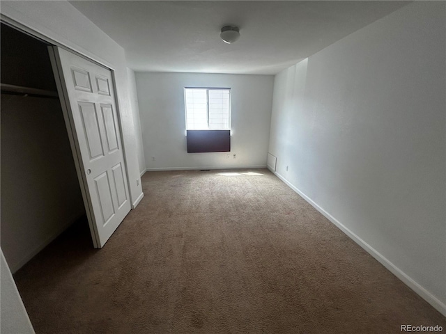 2005 W 86th Ave, Denver, CO 80260 - unfurnished bedroom featuring carpet floors and a closet