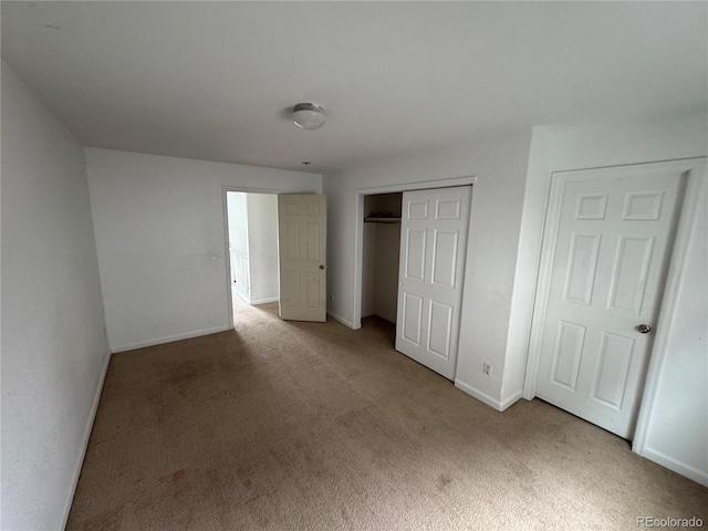 2005 W 86th Ave, Denver, CO 80260 - unfurnished bedroom featuring carpet floors and a closet