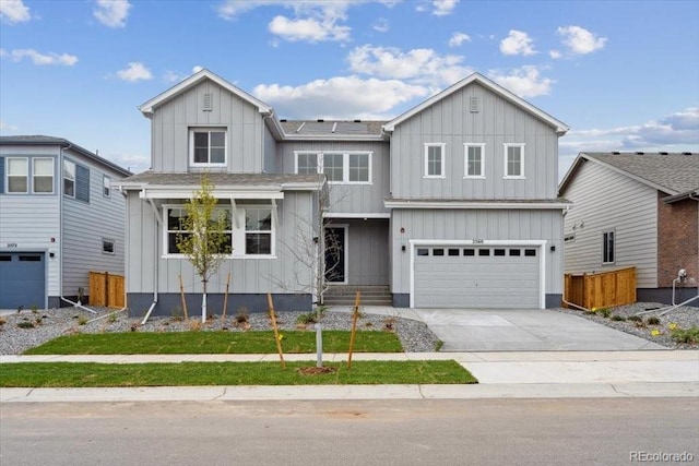 2560 Wesley Ln, Lafayette, CO 80026 - modern inspired farmhouse with fence, a garage, concrete driveway, and board and batten siding
