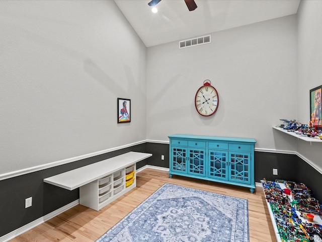5497 W Prentice Ct, Littleton, CO 80123 - interior space with wood finished floors, ceiling fan, and vaulted ceiling