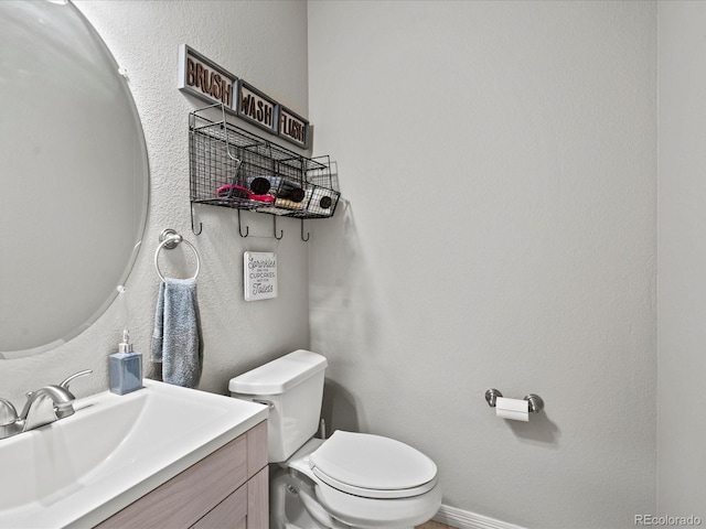 5497 W Prentice Ct, Littleton, CO 80123 - half bathroom with toilet and vanity
