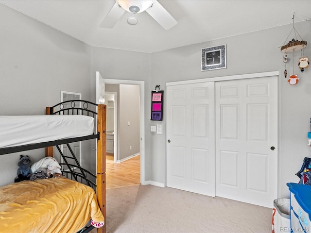 5497 W Prentice Ct, Littleton, CO 80123 - bedroom featuring light colored carpet, a closet, and ceiling fan