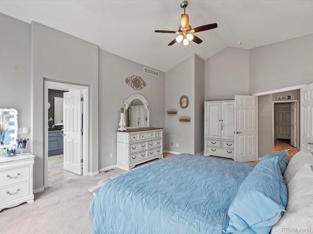 5497 W Prentice Ct, Littleton, CO 80123 - bedroom featuring high vaulted ceiling, light colored carpet, connected bathroom, and ceiling fan