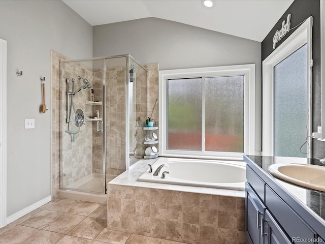5497 W Prentice Ct, Littleton, CO 80123 - bathroom featuring a bath, a stall shower, vaulted ceiling, vanity, and tile patterned floors