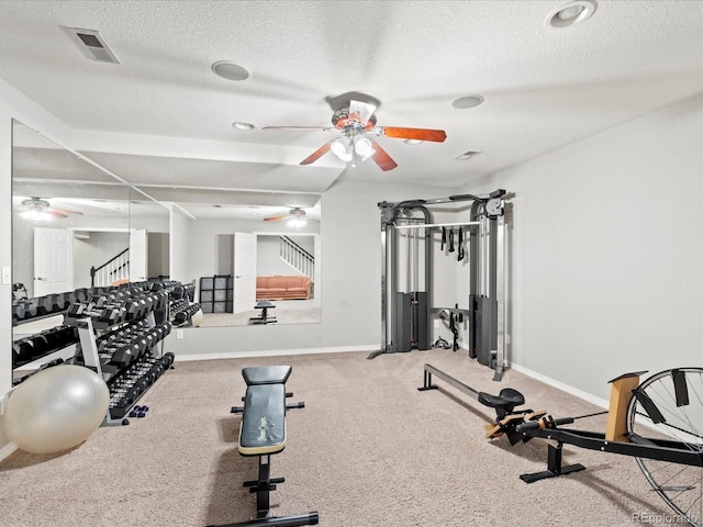 5497 W Prentice Ct, Littleton, CO 80123 - workout area featuring ceiling fan, carpet flooring, and a textured ceiling
