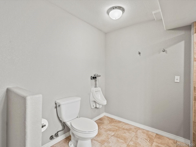 5497 W Prentice Ct, Littleton, CO 80123 - bathroom with a textured ceiling and tile patterned floors