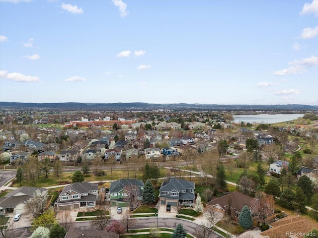 5497 W Prentice Ct, Littleton, CO 80123 - aerial overview of property's location featuring nearby suburban area and a nearby body of water