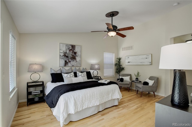 2840 Canyon Crest Ln, Highlands Ranch, CO 80126 - bedroom featuring wood finished floors, baseboards, vaulted ceiling, and ceiling fan
