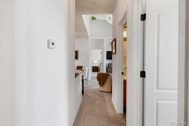 5378 Palomino Ranch Pt Unit 303, Colorado Springs, CO 80922 - hallway with light colored carpet and baseboards