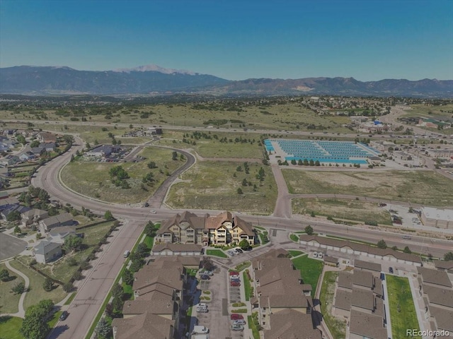 5378 Palomino Ranch Pt Unit 303, Colorado Springs, CO 80922 - bird's eye view featuring a mountain view