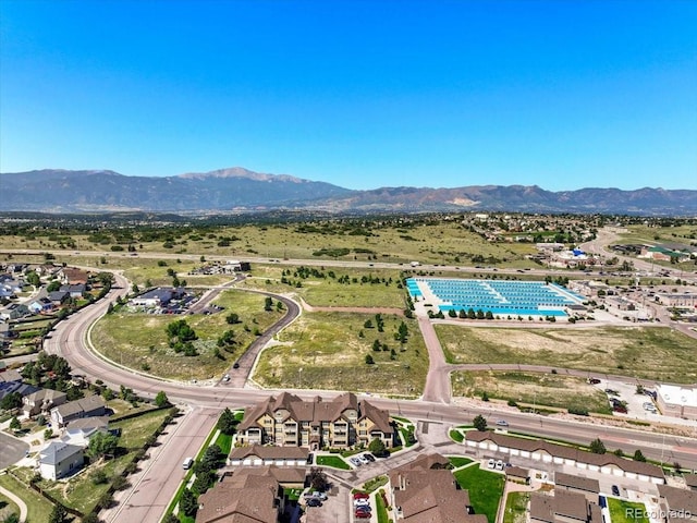 5378 Palomino Ranch Pt Unit 303, Colorado Springs, CO 80922 - aerial view featuring a mountain view