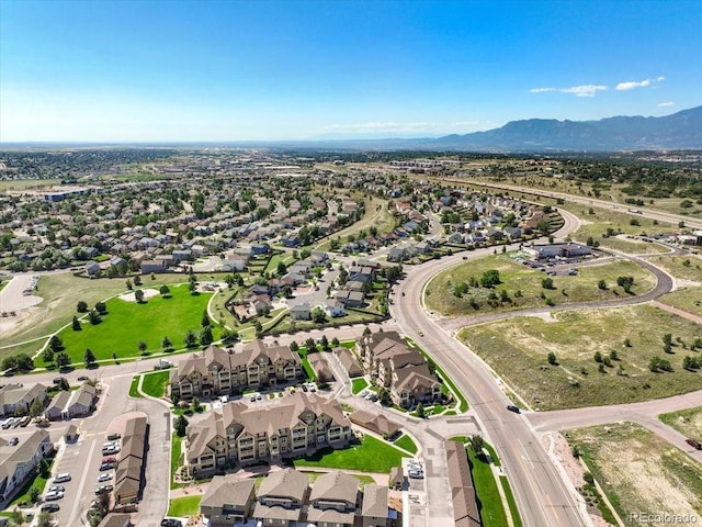 5378 Palomino Ranch Pt Unit 303, Colorado Springs, CO 80922 - birds eye view of property featuring a mountain view and a residential view