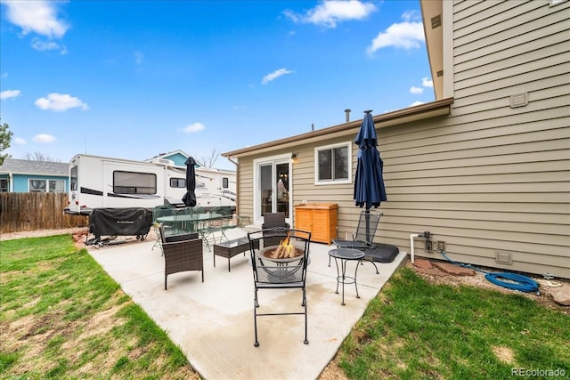 1345 2nd Street Rd, Eaton, CO 80615 - view of patio with fence and a fire pit