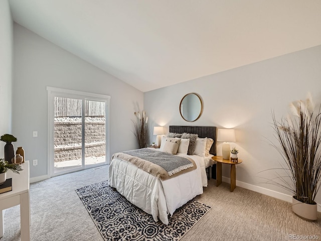 carpeted bedroom with lofted ceiling and access to exterior