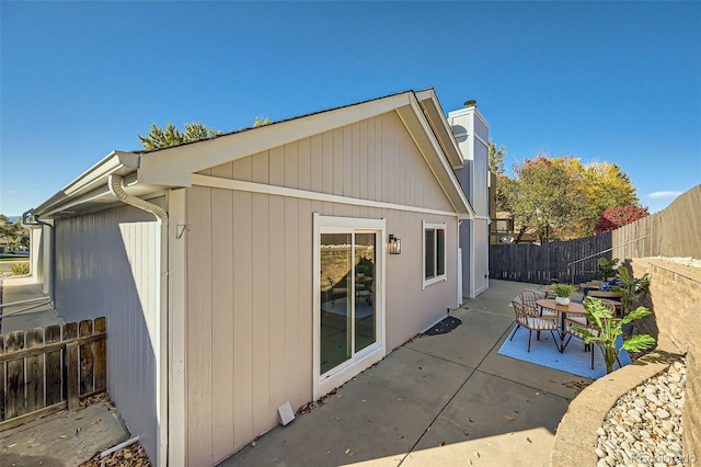 rear view of house featuring a patio