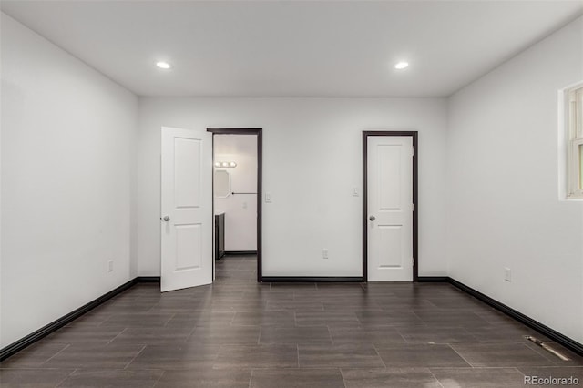 299 4th Ave, Limon, CO 80828 - unfurnished bedroom with recessed lighting and baseboards