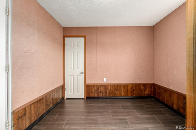 299 4th Ave, Limon, CO 80828 - unfurnished room featuring a textured ceiling