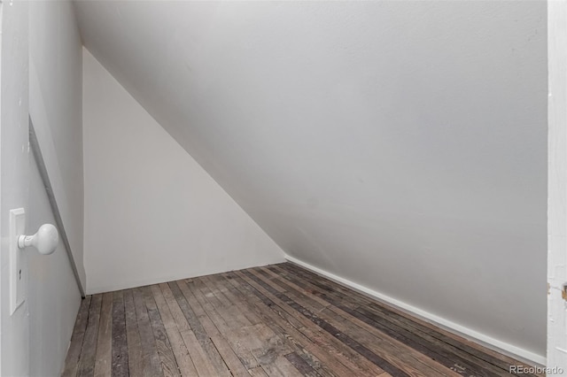 299 4th Ave, Limon, CO 80828 - bonus room featuring hardwood / wood-style flooring and lofted ceiling