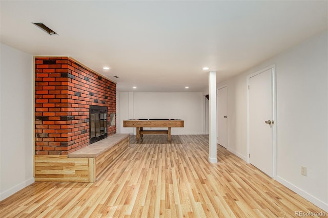 299 4th Ave, Limon, CO 80828 - playroom with wood finished floors, a fireplace, recessed lighting, baseboards, and billiards table