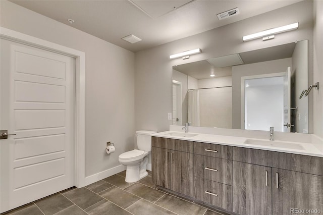 bathroom with vanity, toilet, tile patterned flooring, and a shower with shower curtain