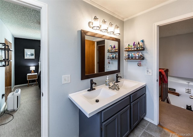 full bathroom featuring a sink, ornamental molding, and double vanity