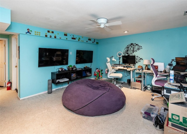 office space with a ceiling fan, baseboards, and visible vents
