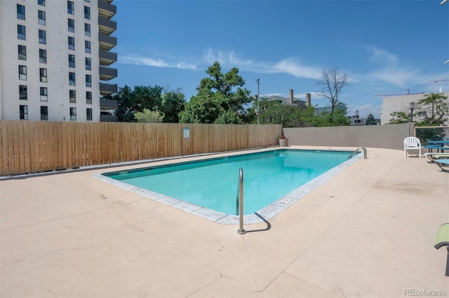 view of pool with a patio area