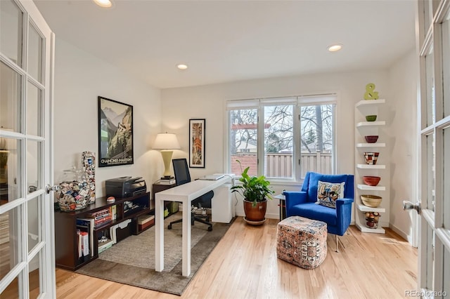4565 E Mexico Ave Unit 3, Denver, CO 80222 - home office featuring french doors, light wood-type flooring, and recessed lighting