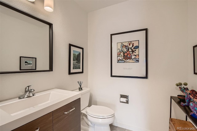 4565 E Mexico Ave Unit 3, Denver, CO 80222 - half bath with vanity and tile patterned floors