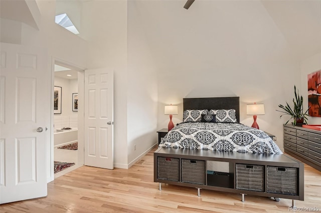4565 E Mexico Ave Unit 3, Denver, CO 80222 - bedroom with wood finished floors and high vaulted ceiling