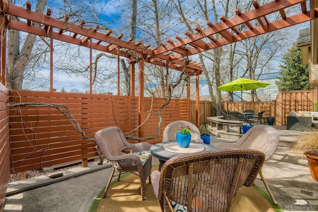 4565 E Mexico Ave Unit 3, Denver, CO 80222 - fenced backyard with a pergola, a patio area, and outdoor dining area